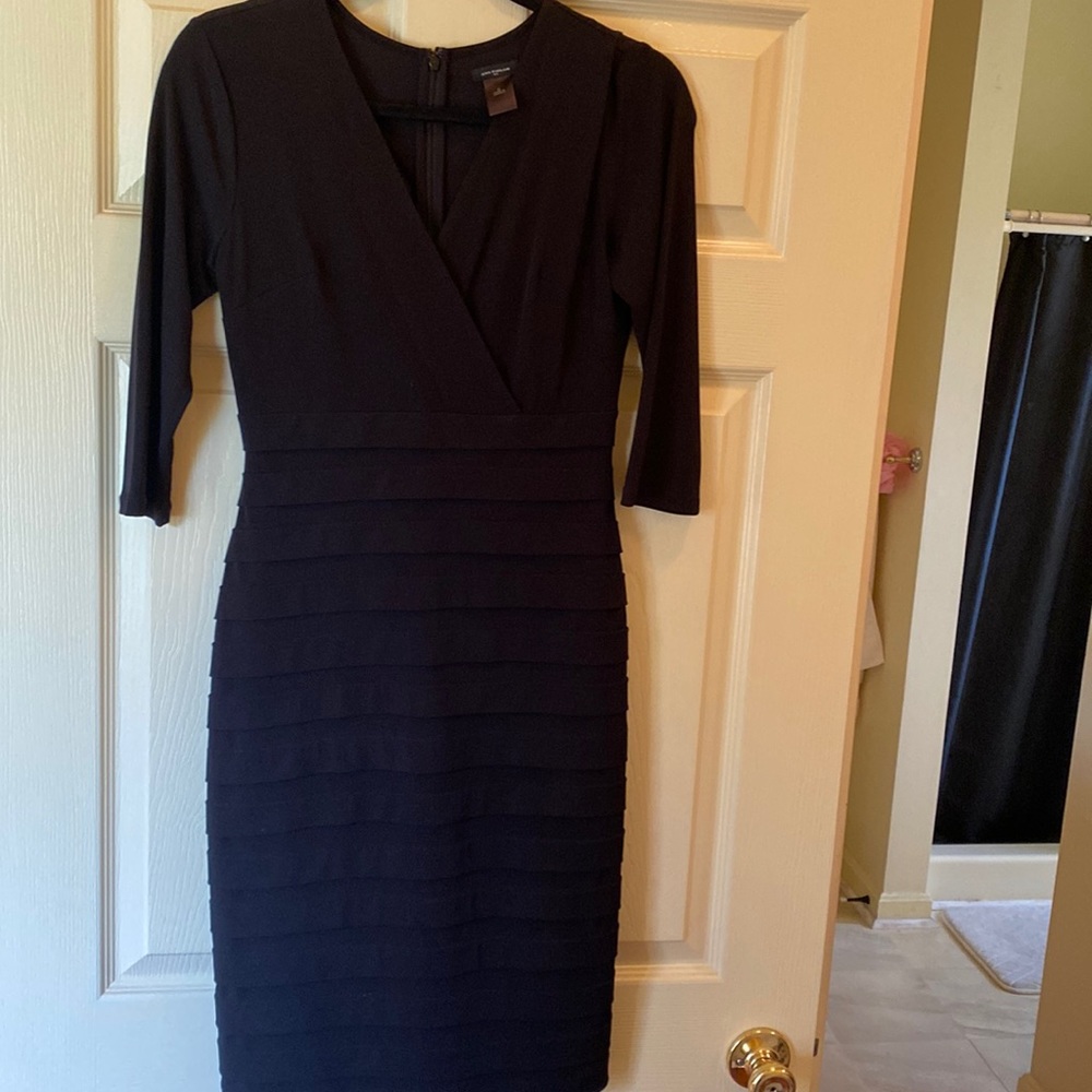 NWT line black dress in perfect shape.